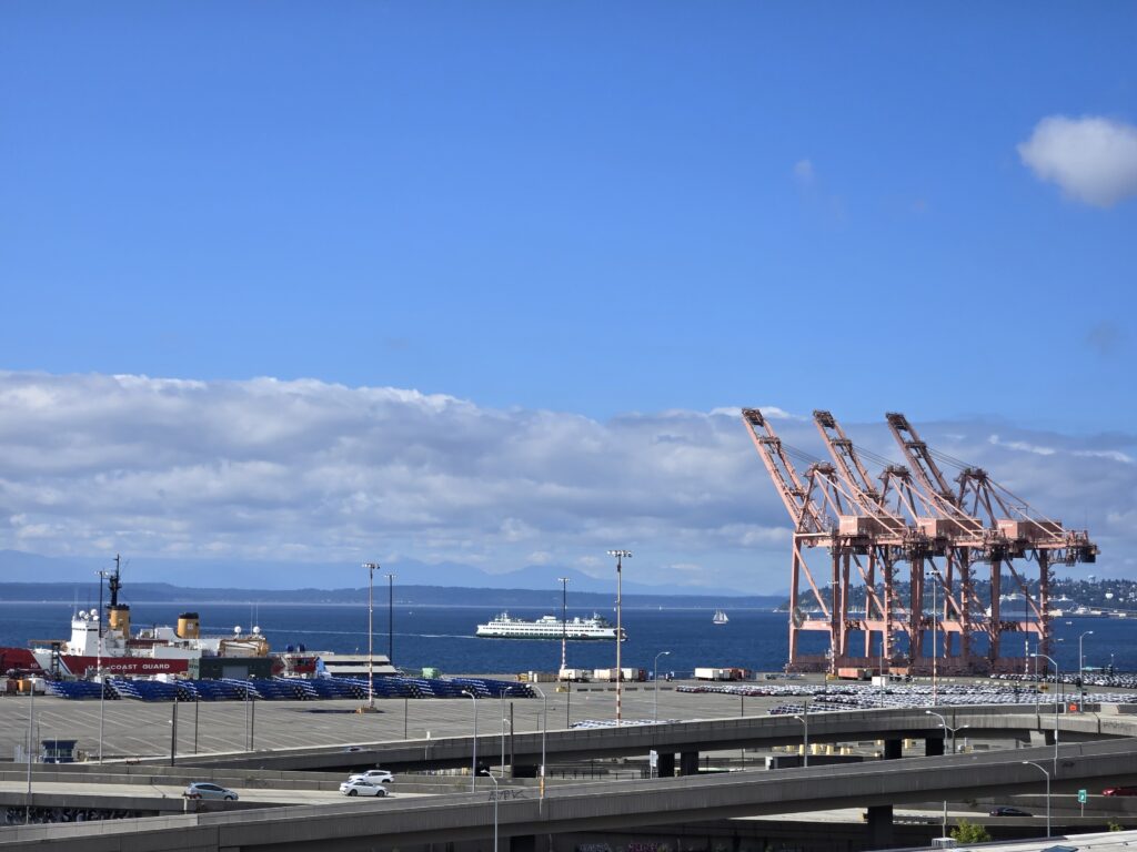 A photo of Elliott Bay, Seattle, WA looking NW taken from a rooftop deck at T-Mobile Park, September 15, 2024.